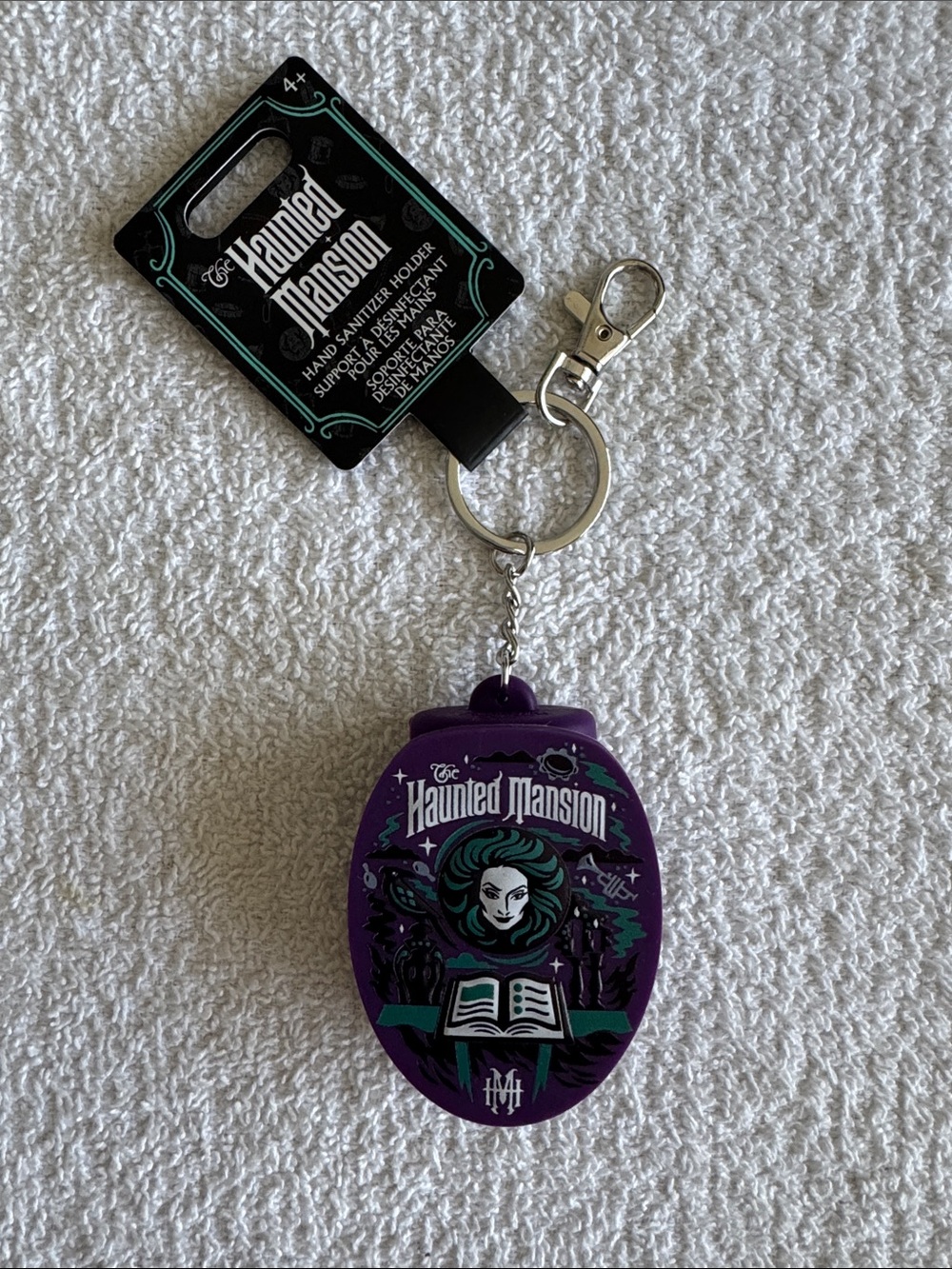 Disney Disneyland The Haunted Mansion Hand Sanitizer Purple Holder Keychain